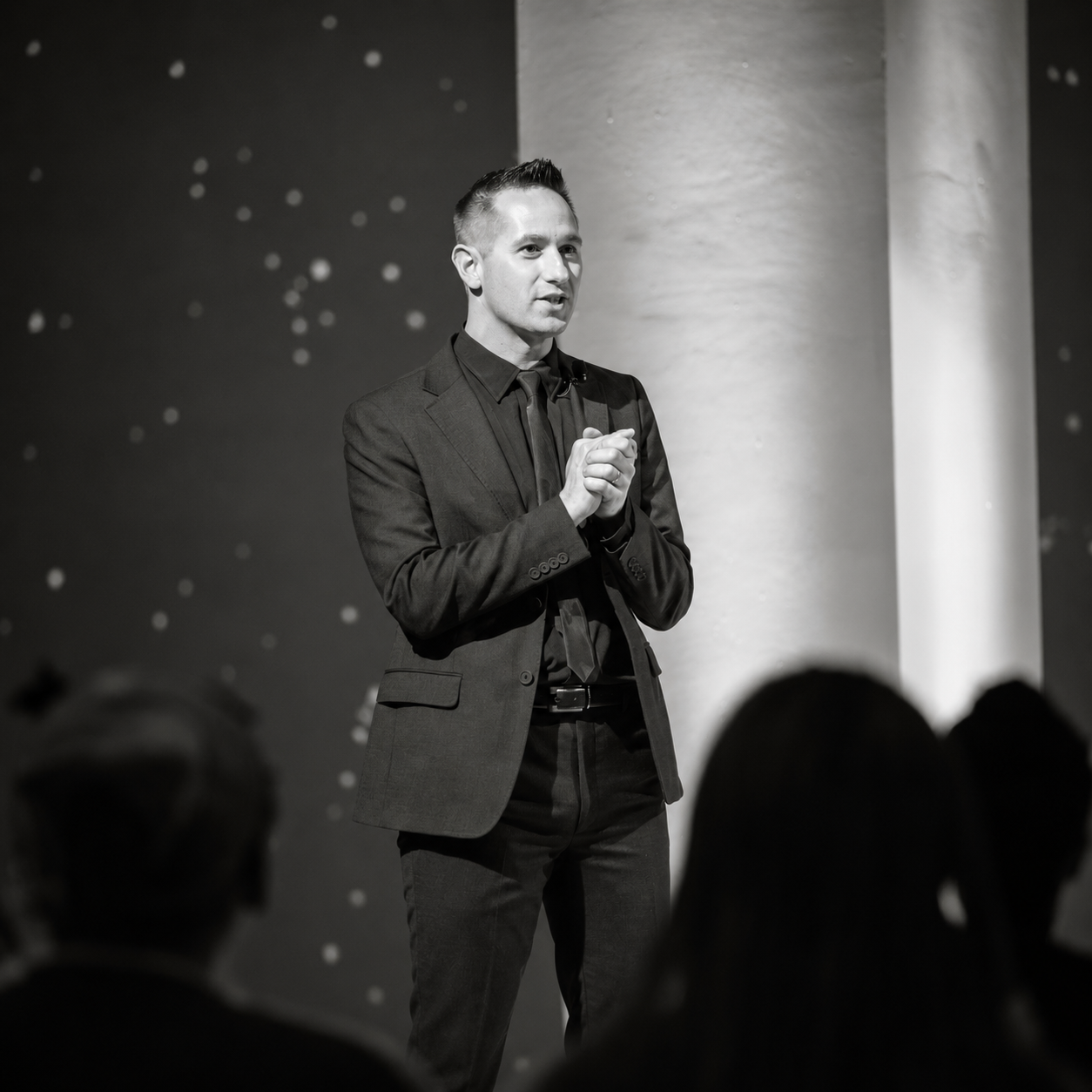 Collin Castellaw speaking on stage